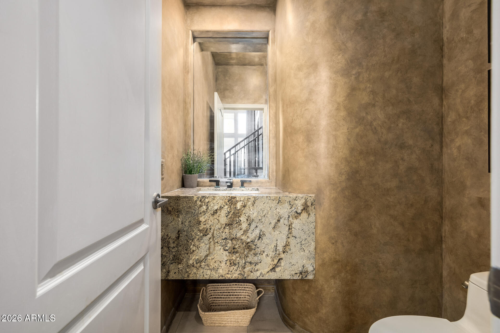 4430 North 22nd Street, Unit 3 Phoenix, AZ 85016 - Photo 21 of 68 a bathroom with a granite countertop window and a toilet