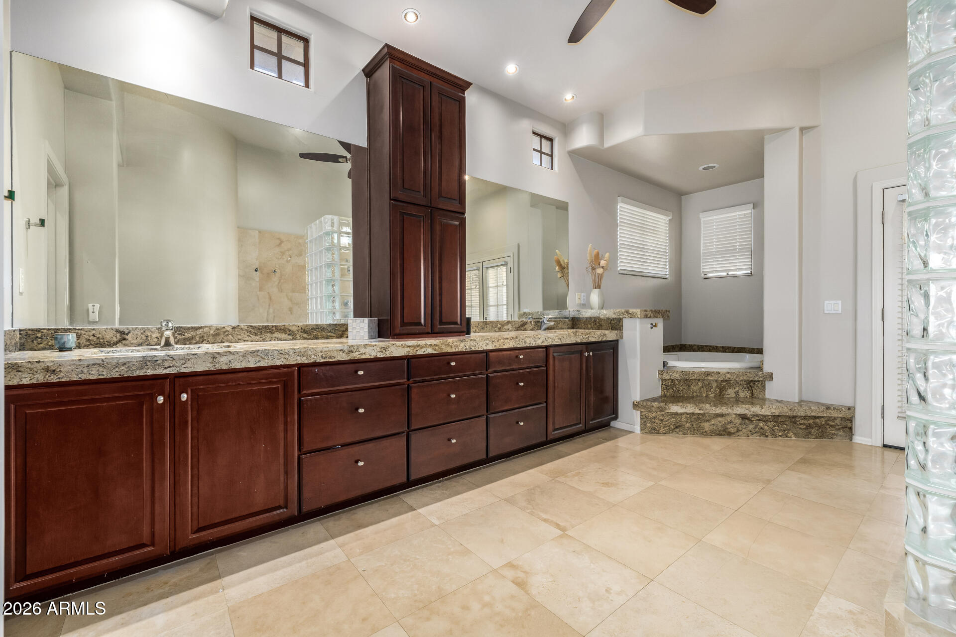 4430 North 22nd Street, Unit 3 Phoenix, AZ 85016 - Photo 24 of 68 a bathroom with a granite countertop double vanity sink and a mirror