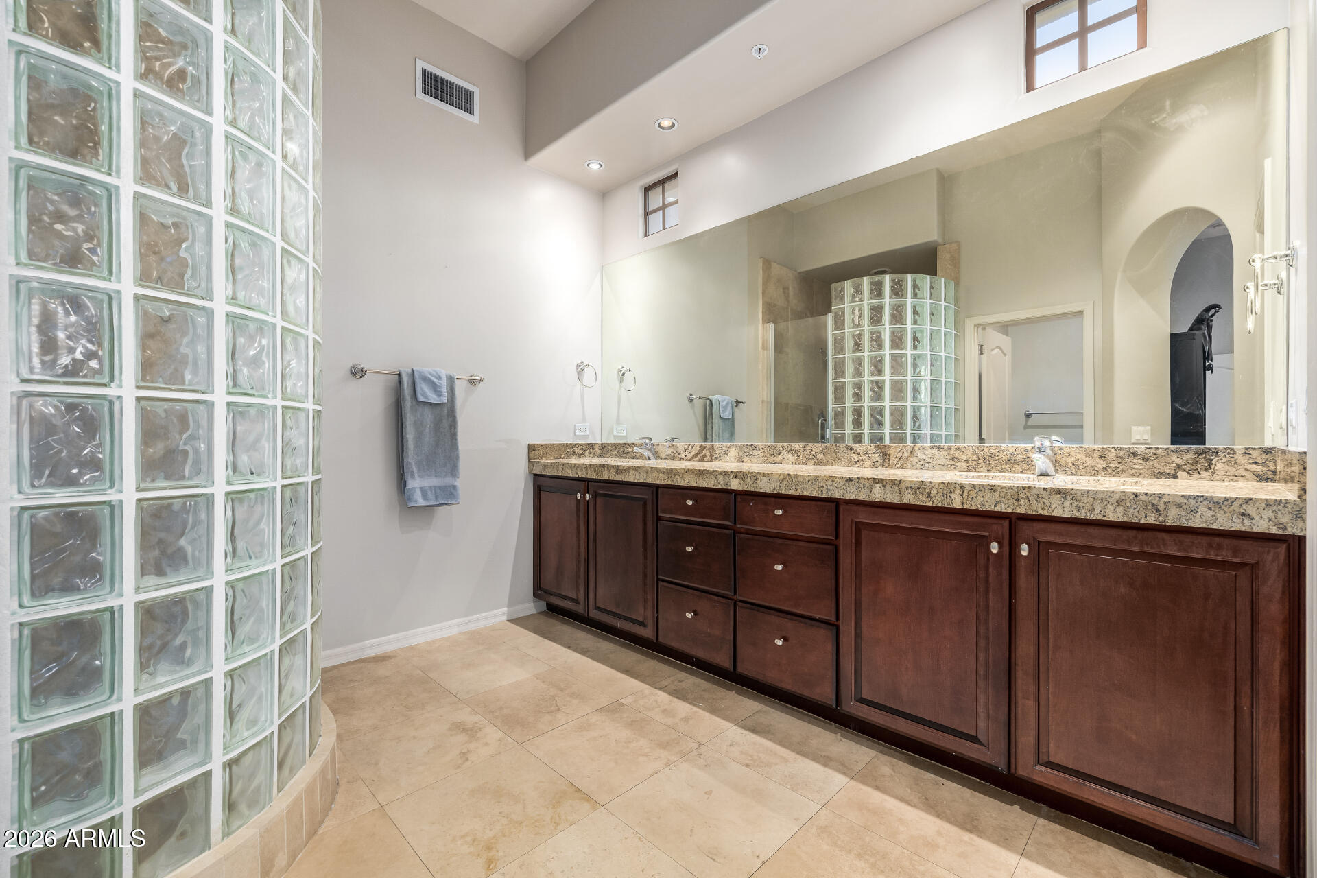 4430 North 22nd Street, Unit 3 Phoenix, AZ 85016 - Photo 31 of 68 a bathroom with a double vanity sink and a mirror