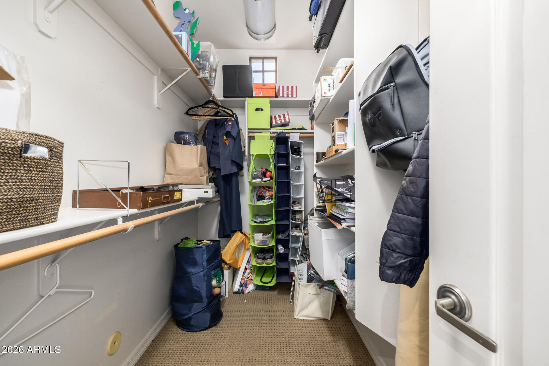 4430 North 22nd Street, Unit 3 Phoenix, AZ 85016 - Photo 33 of 68 a view of walk in closet with clothes and shoes