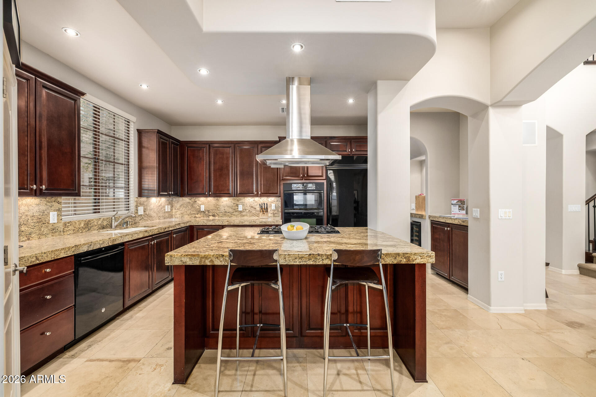 4430 North 22nd Street, Unit 3 Phoenix, AZ 85016 - Photo 4 of 68 a kitchen with stainless steel appliances kitchen island granite countertop a stove a sink and a refrigerator