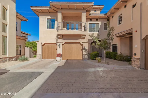 a kitchen with stainless steel appliances granite countertop a stove and a sink