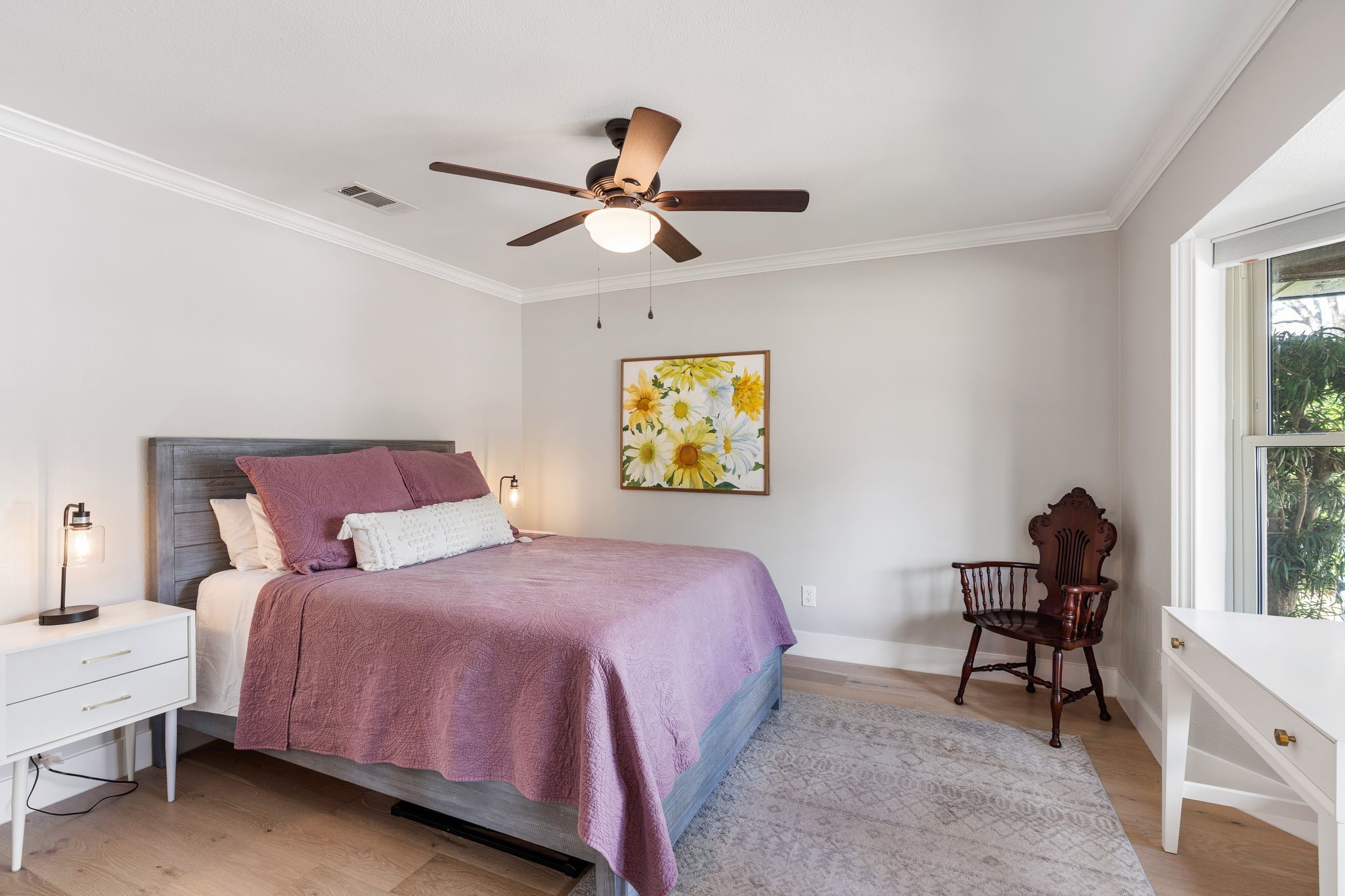 4423 Apollo Street Houston, TX 77018 - Photo 18 of 34 The third guest room provides a bright and comfortable retreat highlighted by abundant natural light. It's clean neutral tone makes it ideal for a bedroom, home office or creative studio.