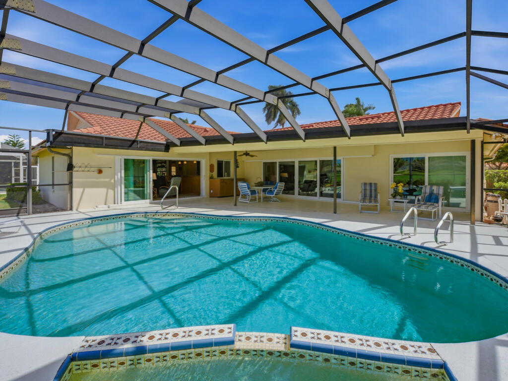314 Torrey Pines Point Naples, FL 34113 - Photo 21 of 21 an outdoor space with swimming pool