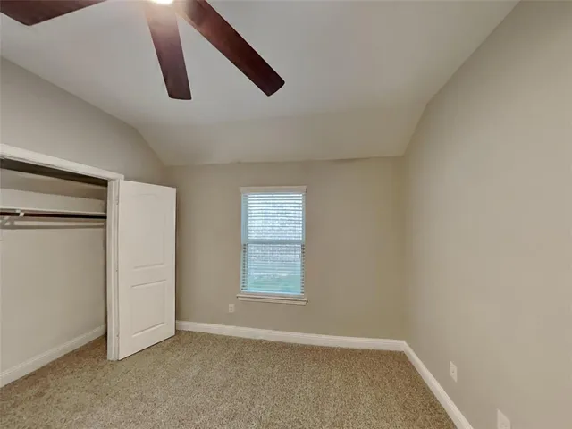 an empty room with closet