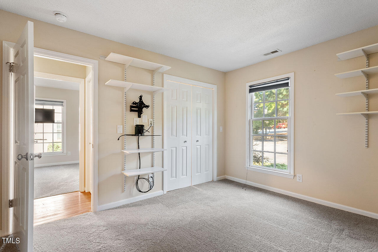 3124 Coachman's Way Durham, NC 27705 - Photo 21 of 30 an empty room with windows and closet