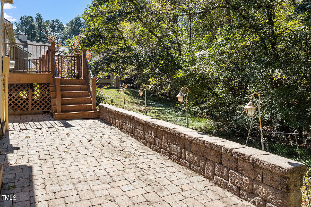 3124 Coachman's Way Durham, NC 27705 - Photo 26 of 30 a view of a pathway with a wrought fence