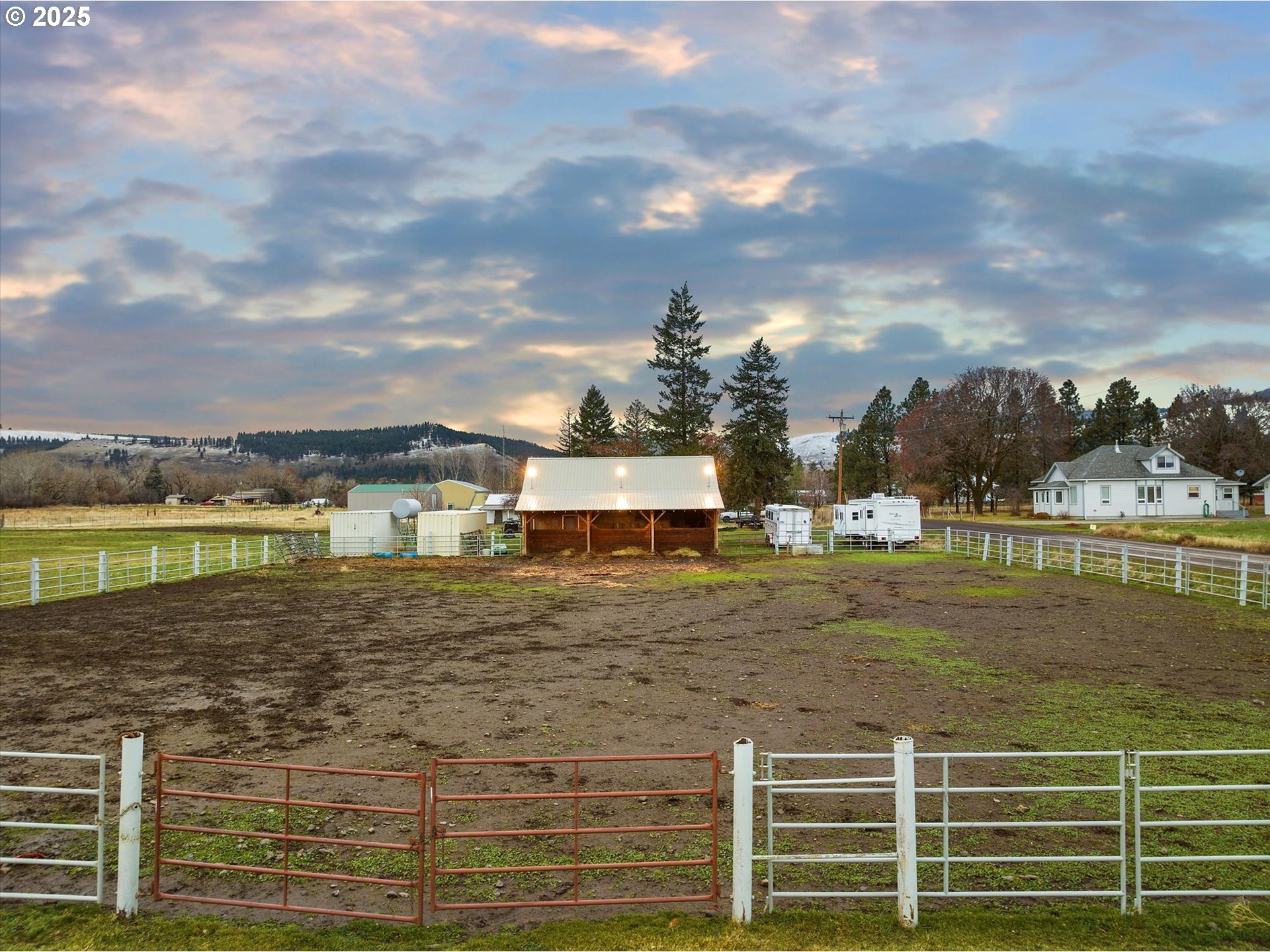 62123 Chandler Loop La Grande, OR 97850 - Photo 11 of 48 a view of a lake with a big yard