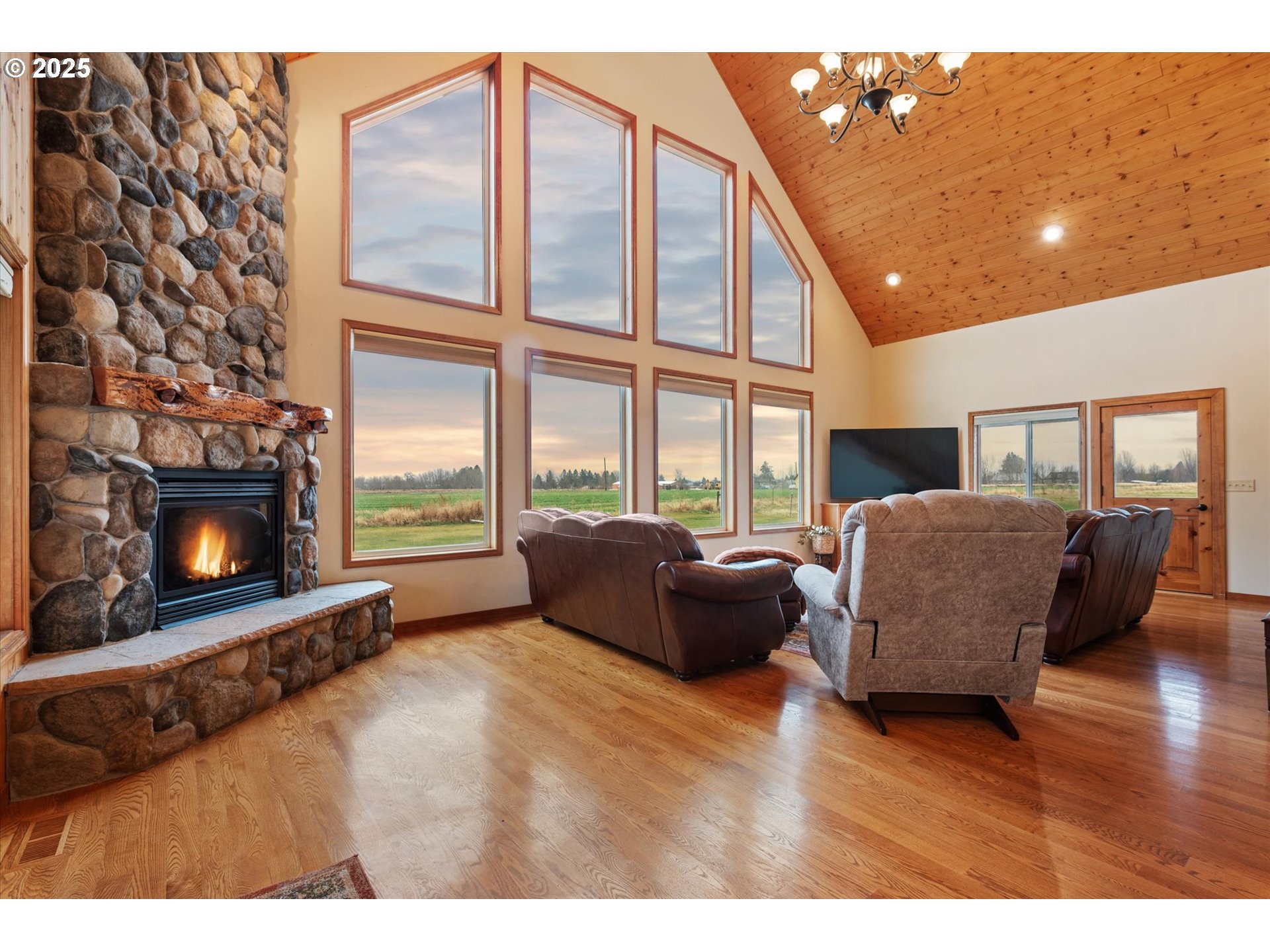 62123 Chandler Loop La Grande, OR 97850 - Photo 15 of 48 a living room with furniture and a fireplace