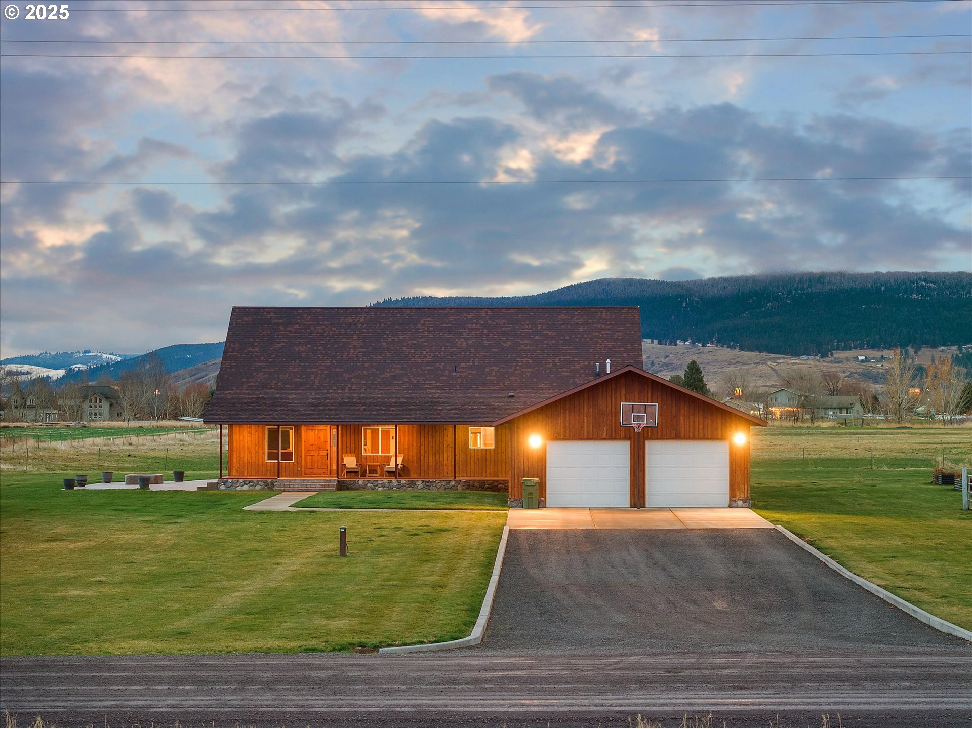 62123 Chandler Loop La Grande, OR 97850 - Photo 2 of 48 a view of an house with backyard and pool