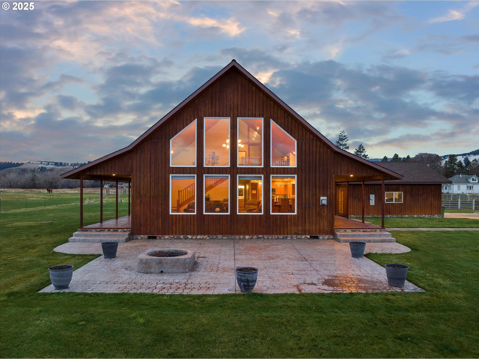 62123 Chandler Loop La Grande, OR 97850 - Photo 4 of 48 a front view of house with yard and outdoor seating