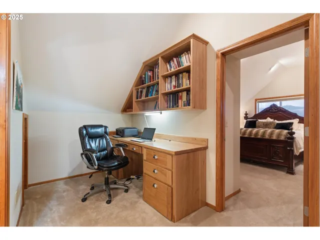 a workspace with furniture and bedroom view