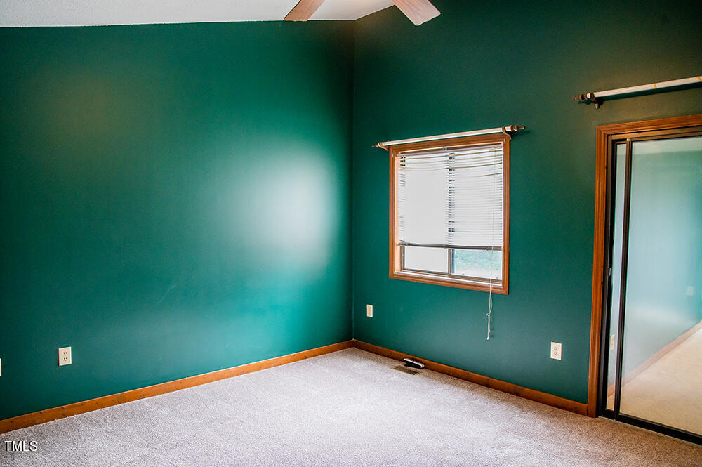 1891 Berry Pearce Road Timberlake, NC 27583 - Photo 32 of 54 a view of an empty room with a window