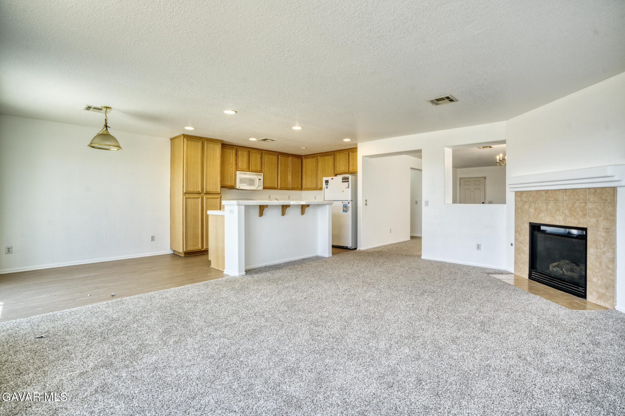 45444 Spahn Lane Lancaster, CA 93535 - Photo 4 of 13 a view of a livingroom with a fireplace