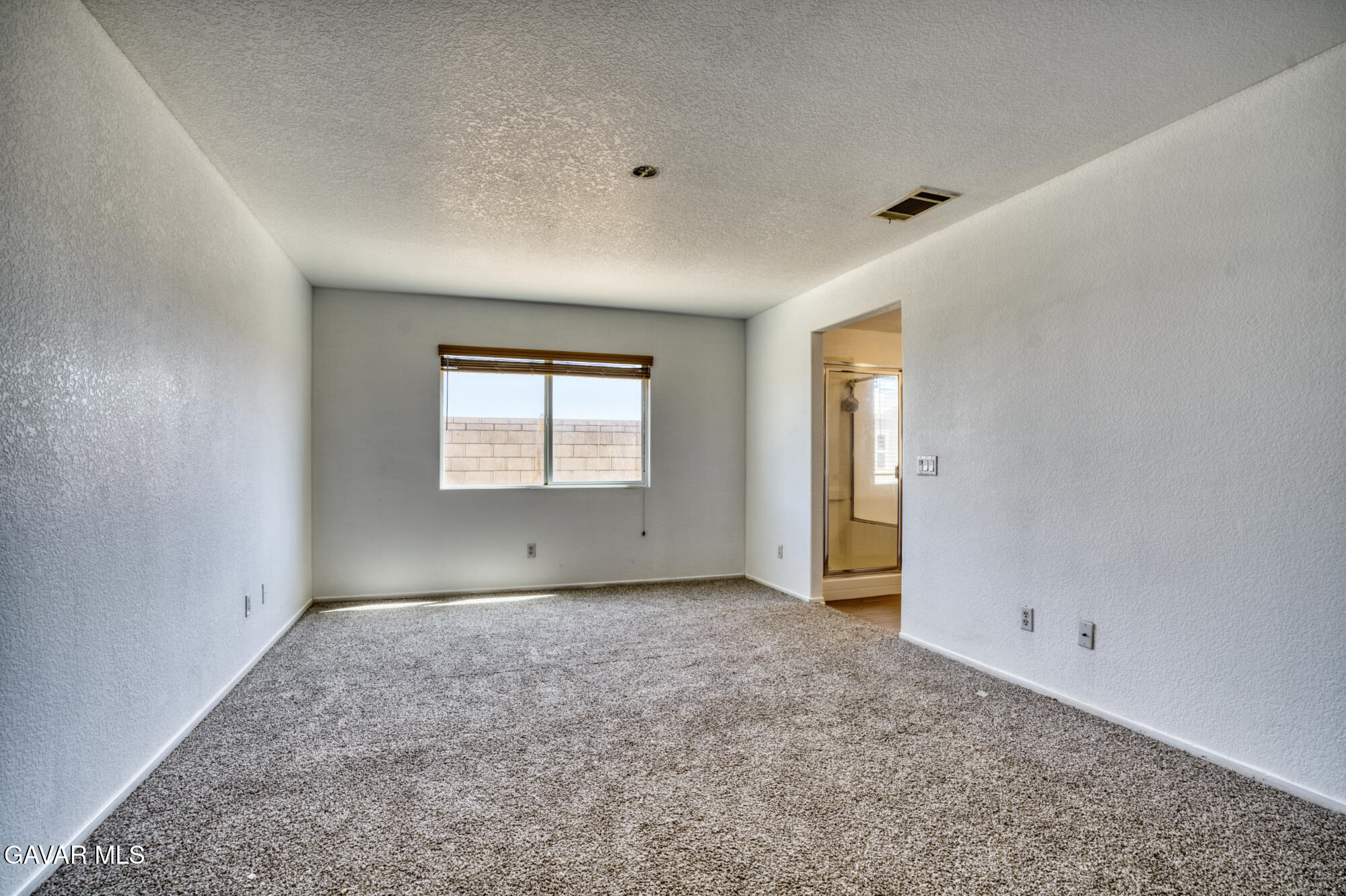 45444 Spahn Lane Lancaster, CA 93535 - Photo 8 of 13 a view of an empty room with a window
