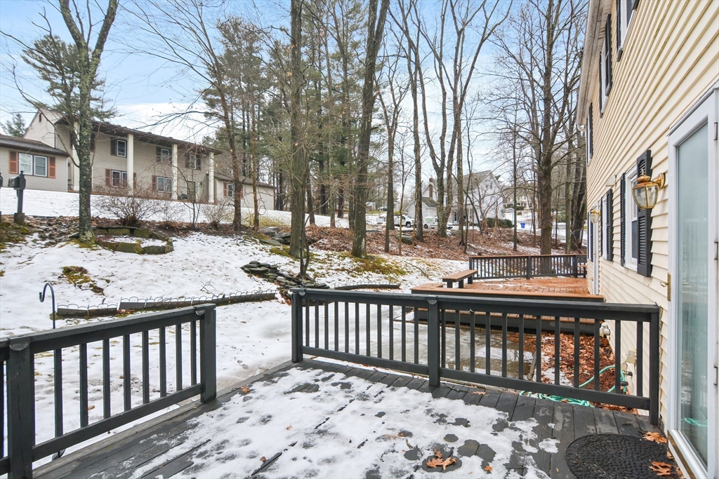 2 Hartness Road, Unit A Sutton, MA 01590 - Photo 20 of 37 a view of a wooden roof deck
