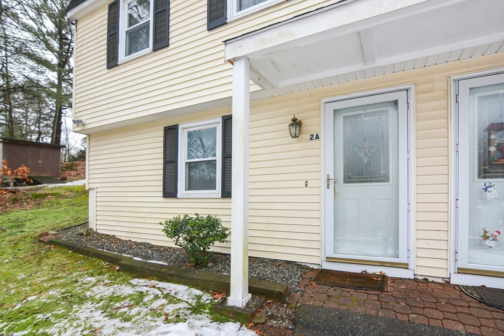 2 Hartness Road, Unit A Sutton, MA 01590 - Photo 3 of 37 a view of a house with a yard
