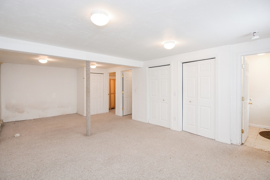 2 Hartness Road, Unit A Sutton, MA 01590 - Photo 5 of 37 an empty room with an entryway