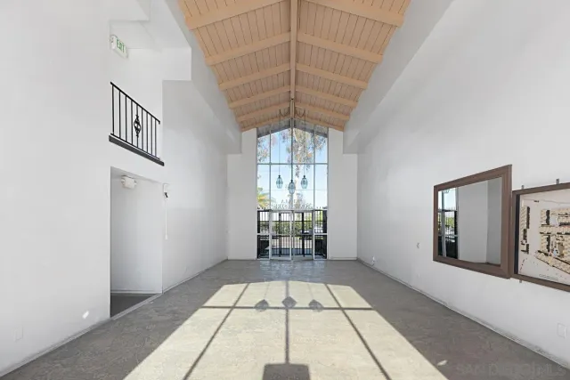 an empty room with windows