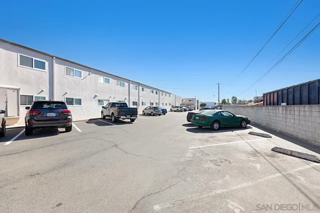 a view of a swimming pool with a lounge chair