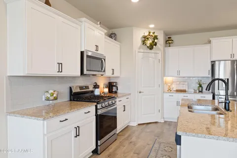 $315,000 | 107 Rue Chateau Royal Drive, Youngsville, LA 70592