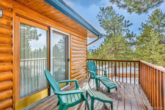 a view of a two chair in the balcony