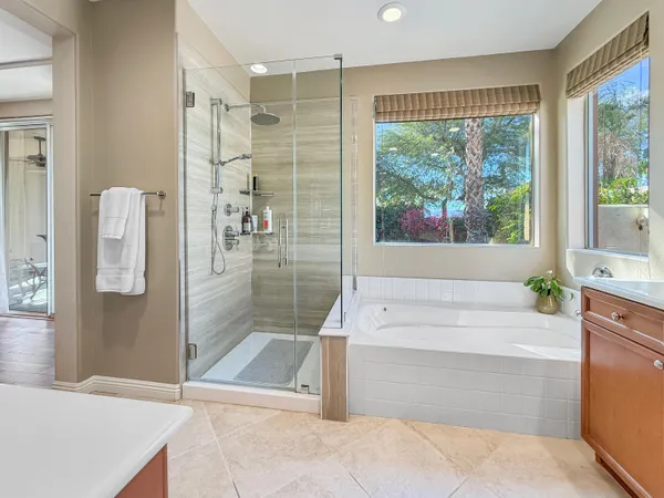 a view of a swimming pool in a backyard