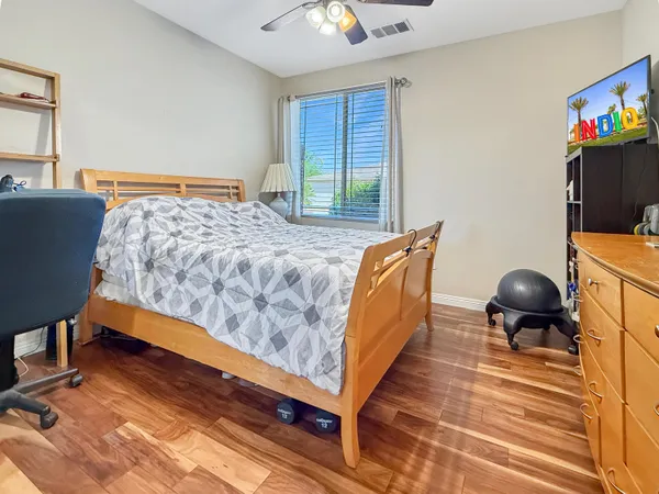 a view of an chairs and tables in patio