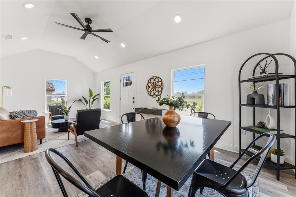 815 Garrison Street Waco, TX 76704 - Photo 11 of 36 a view of a dining room with furniture and a potted plant