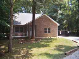 6101 Davis Road Waxhaw, NC 28173 - Photo 2 of 2 a backyard of a house with lots of green space