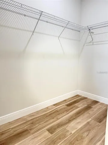 a view of a room with racks on the wall