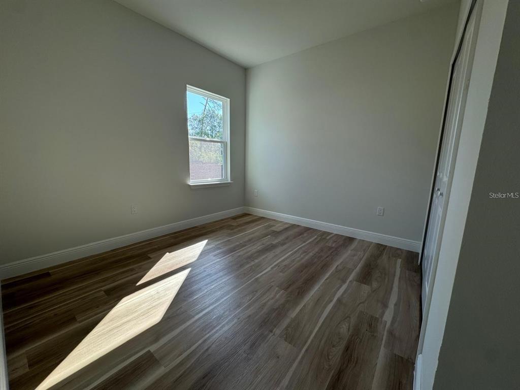 2336 Southwest 168th Loop Ocala, FL 34473 - Photo 35 of 40 a view of wooden floor in a window