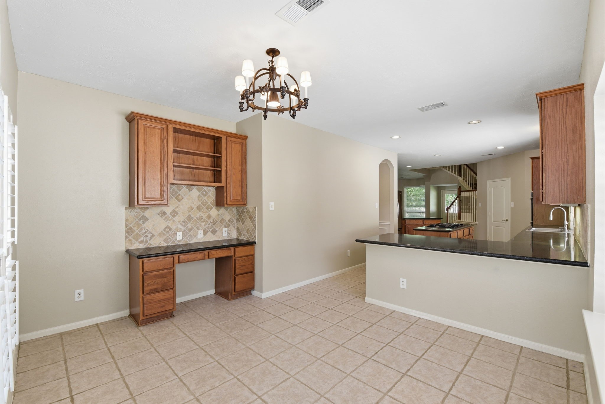 3414 Hackberry Court Spring, TX 77388 - Photo 21 of 50 This large breakfast room also has a built in desk area!