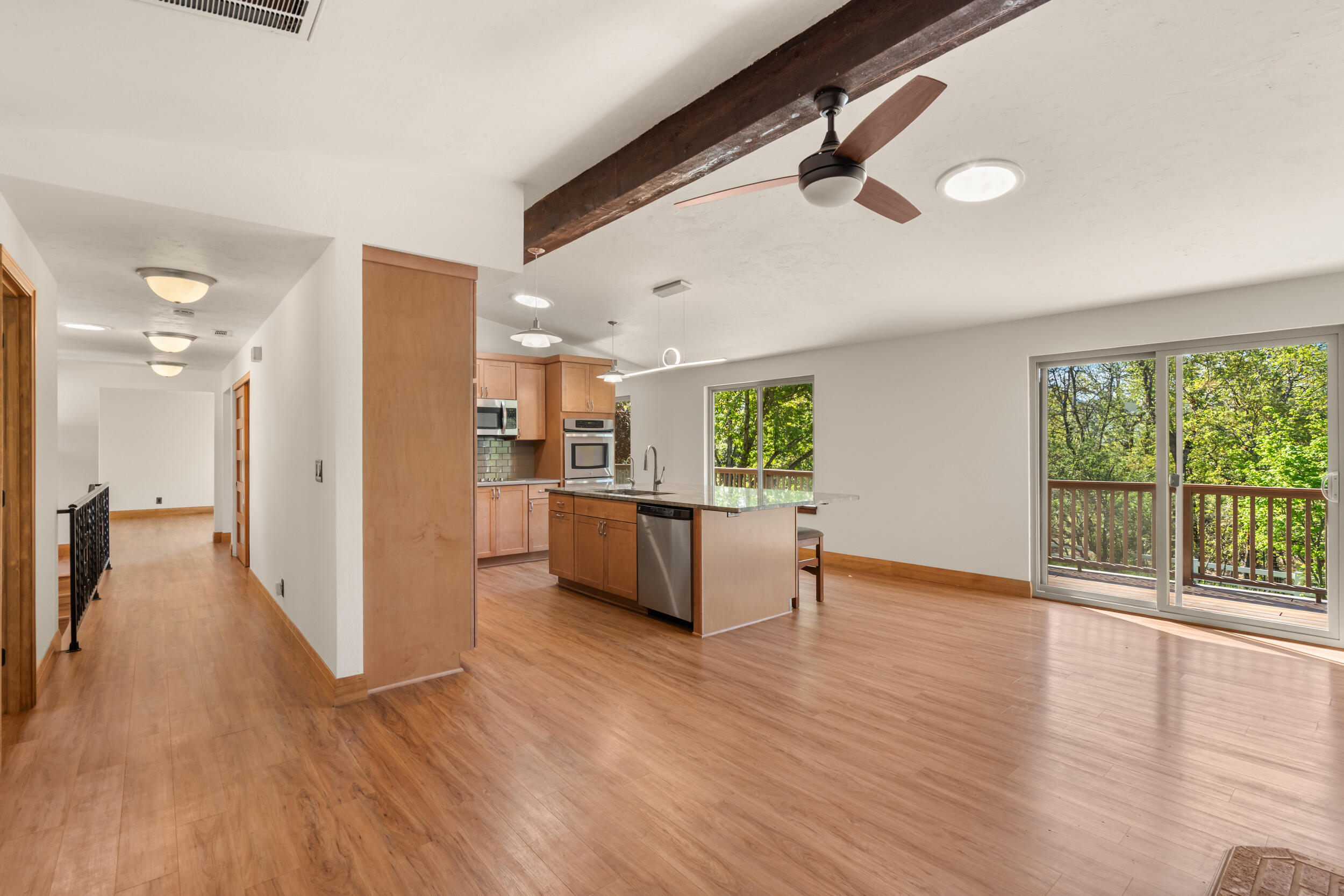 3583 Ross Lane Central Point, OR 97502 - Photo 5 of 52 a view of a living room hardwood floor and a large window