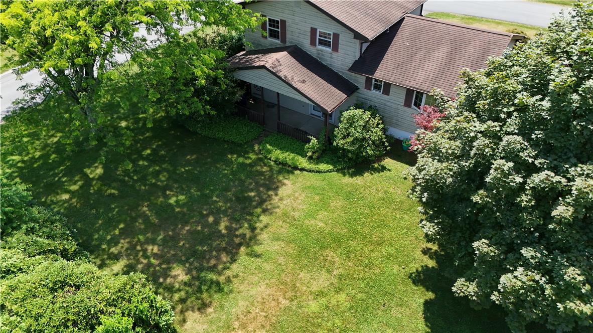 21 Will Barnesville, PA 18214 - Photo 22 of 23 A well-maintained lawn embraces a classic home, shaded by mature trees.
