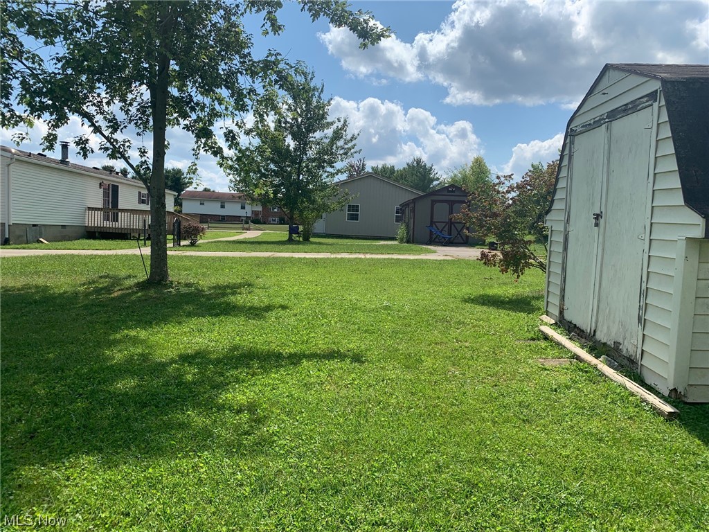 19 Anderson Road Fleming, OH 45729 - Photo 12 of 30 View of yard with a storage unit