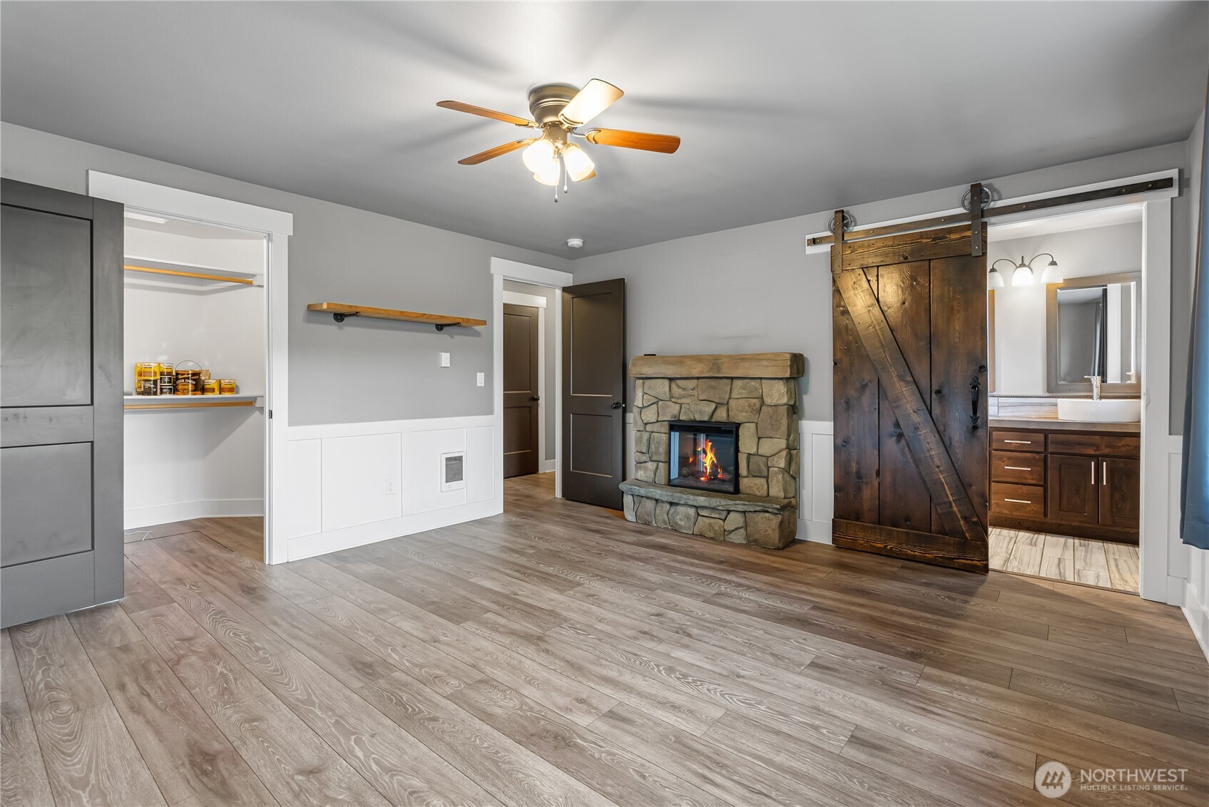 159 Salzer Road Centralia, WA 98531 - Photo 11 of 40 a view of a kitchen with wooden floor and a ceiling fan