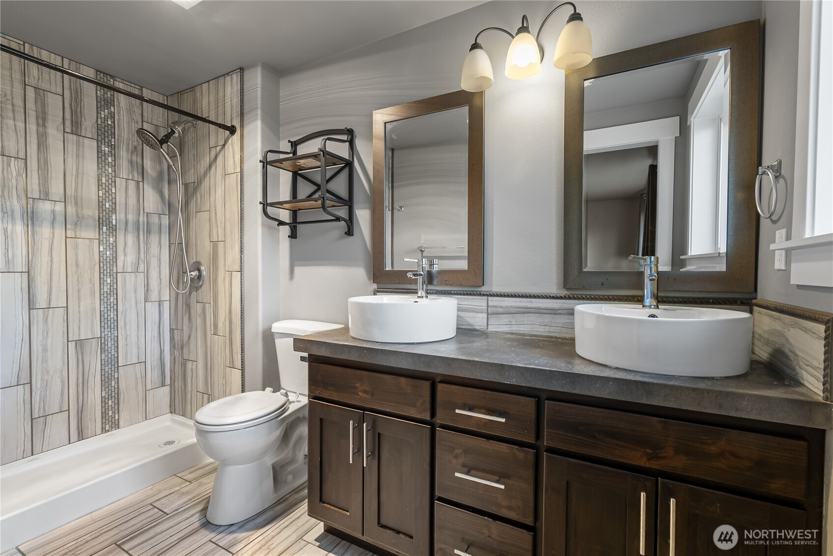 159 Salzer Road Centralia, WA 98531 - Photo 12 of 40 a bathroom with a double vanity sink toilet and a mirror