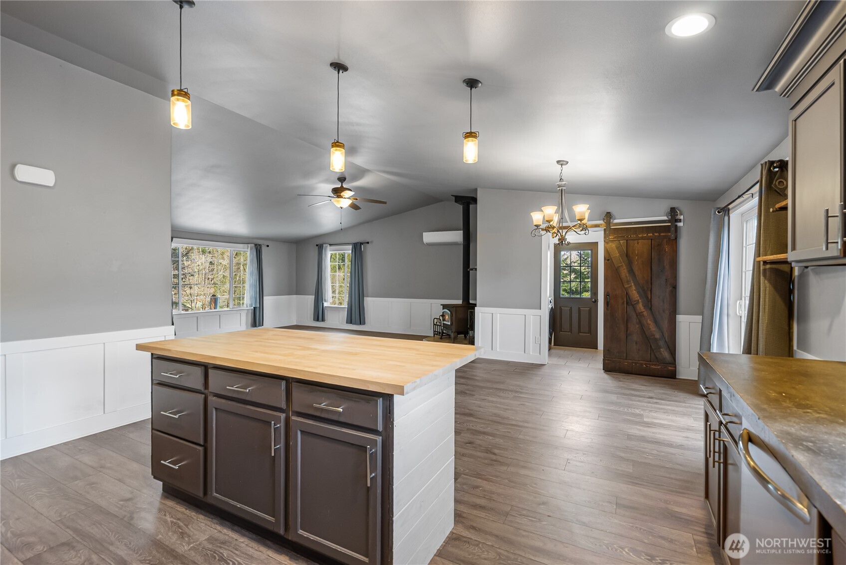 159 Salzer Road Centralia, WA 98531 - Photo 9 of 40 an open kitchen with a table and chairs