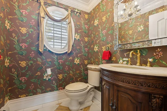 a bathroom with a toilet and a shower curtain