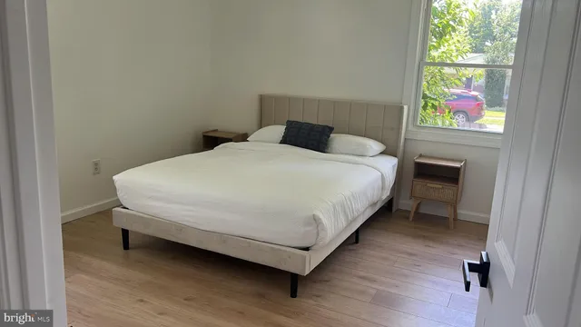 a bathroom with a bathtub and a vanity