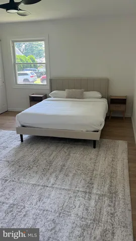 a living room with a couch and a flat screen tv