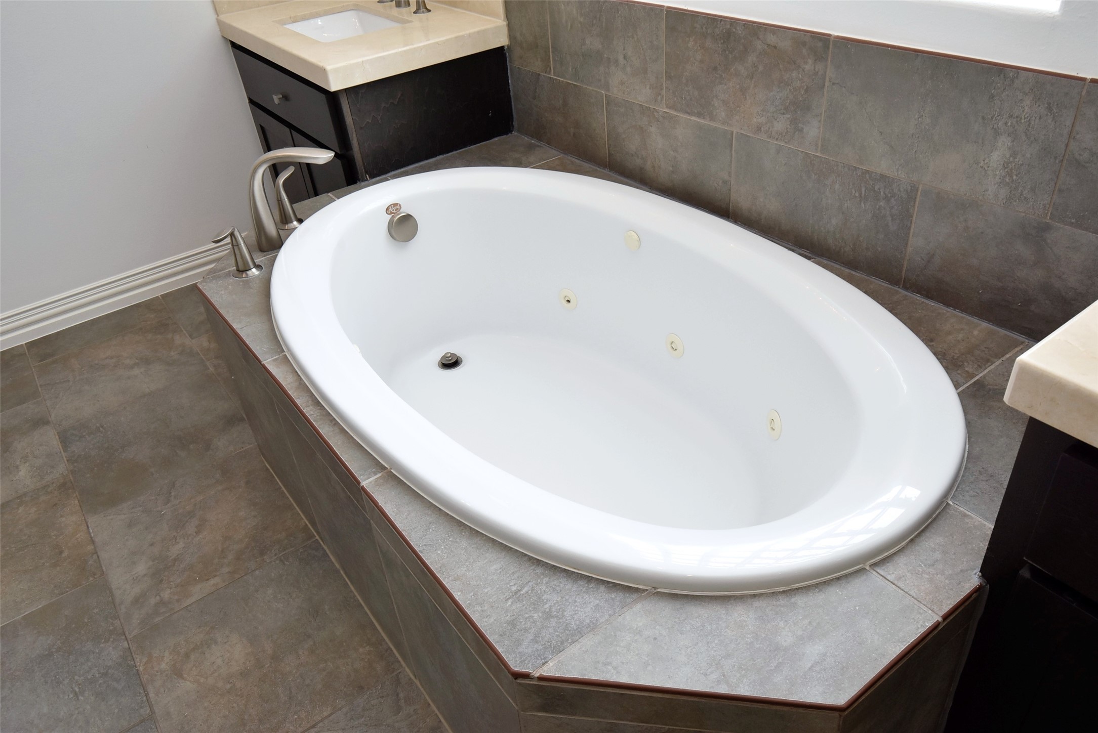 2014 Split Branch Court Houston, TX 77077 - Photo 16 of 47 a white bath tub sitting in a bathroom
