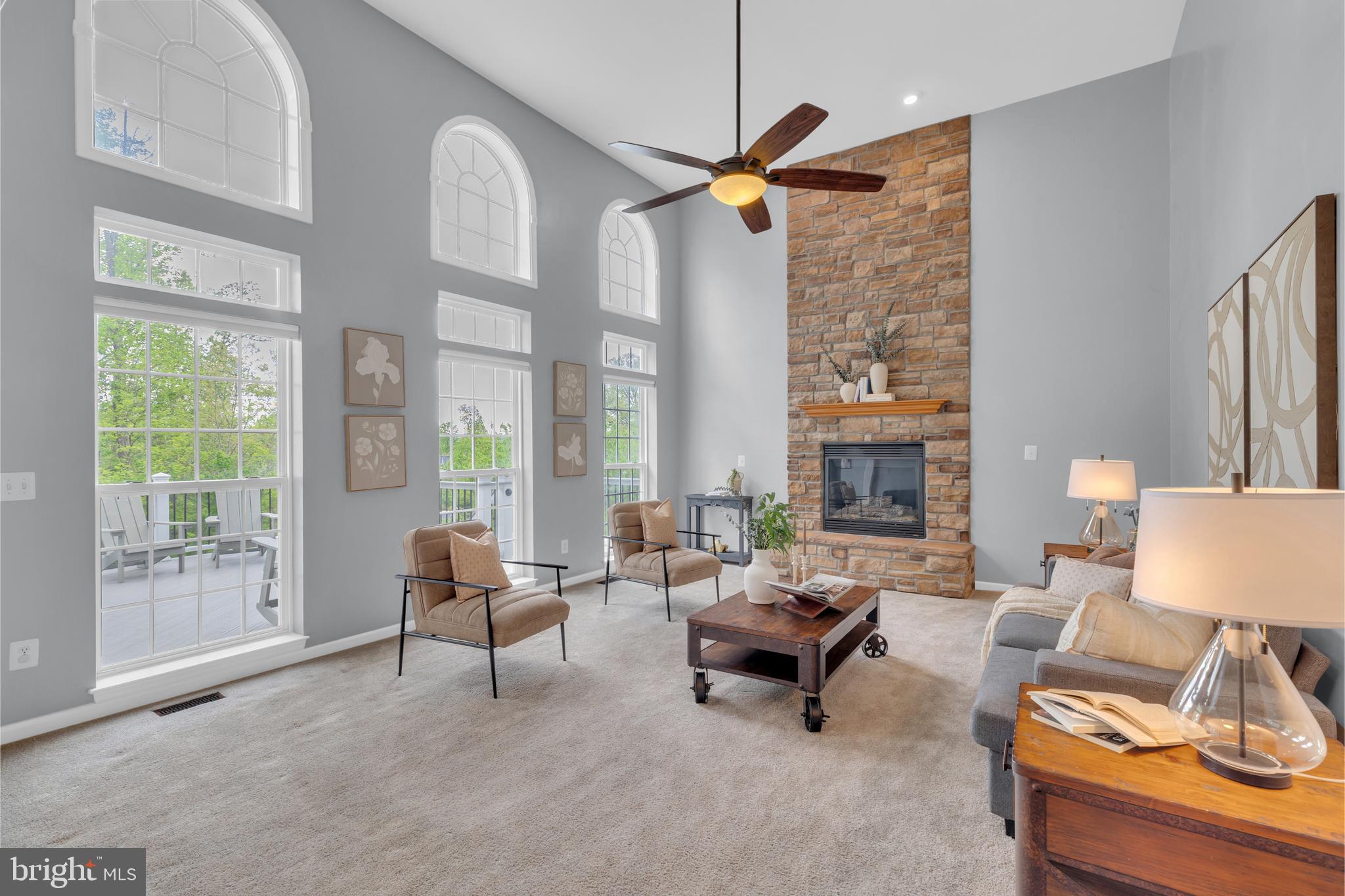 20967 Oneills Way Leesburg, VA 20175 - Photo 15 of 90 Family with wall of windows