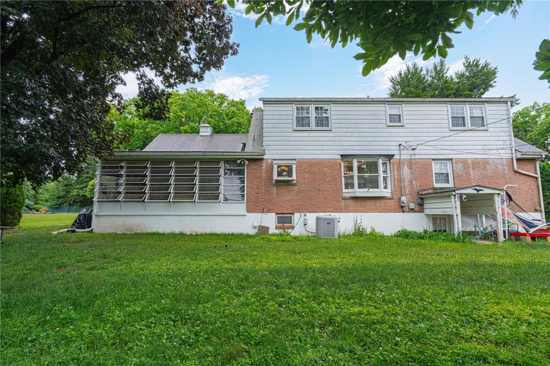 285 Bridle Path Road Bethlehem, PA 18017 - Photo 53 of 54 a front view of a house with a yard and trees
