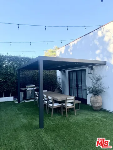 a wooden bench sitting in the middle of a building