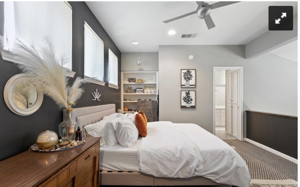 611 East 45th Street, Unit 25 Austin, TX 78751 - Photo 14 of 17 Bedroom featuring carpet flooring, a ceiling fan, recessed lighting, and ensuite bath