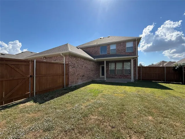 a front view of a house having yard
