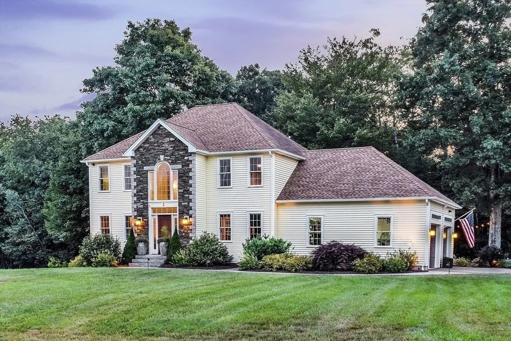 2 Morris Lane Rutland, MA 01543 - Photo 1 of 41 a front view of a house with a garden and yard