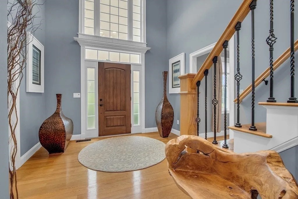 2 Morris Lane Rutland, MA 01543 - Photo 13 of 41 a bedroom with a bed and a chandelier